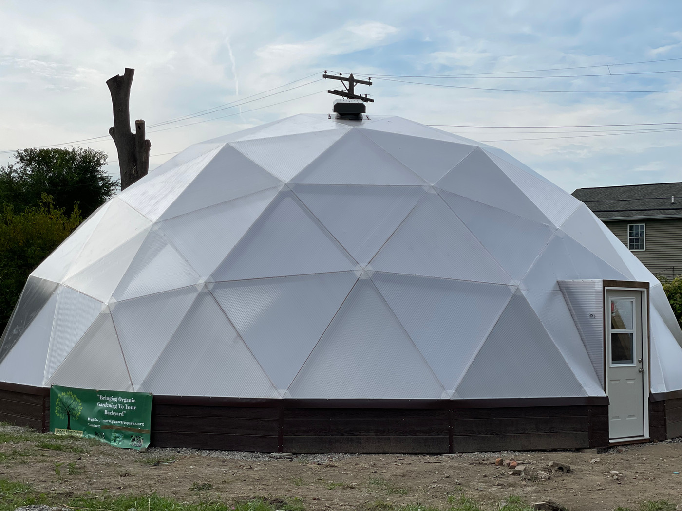 Completed geodesic greenhouse dome at the E. Vernor community garden