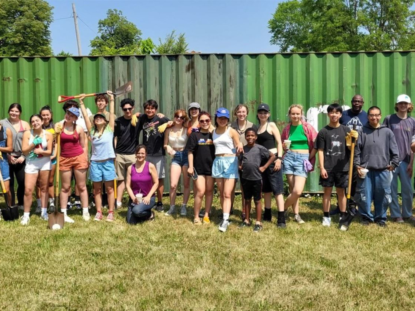 Large group of Detroit volunteers gathered at a Peace Tree Parks volunteer day
